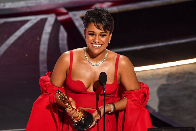 Actress Ariana DeBose accepts the award for Best Actress in a Supporting Role for her performance in "West Side Story" onstage during the Oscars in Los Angeles on Sunday.