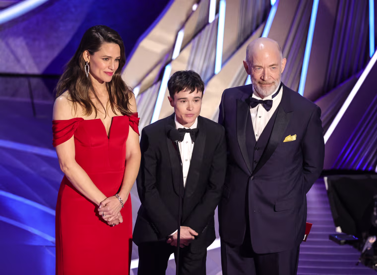 Jennifer Garner, Elliot Page, and J.K. Simmons speak onstage during the Academy Awards in Los Angeles on Sunday.