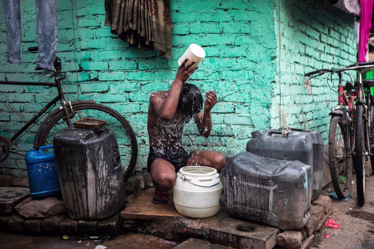 A boy cools off in New Delhi on May 3, 2022.