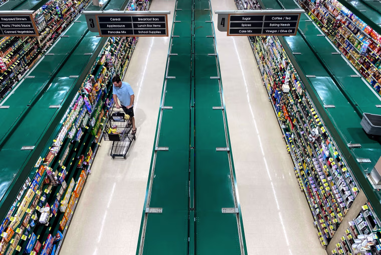 People shop at a supermarket in Arlington, Va., on June 10, 2022.