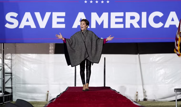 Kari Lake acknowledges the crowd at a Save America Rally prior to her speaking, on Jan. 15, 2022, in Florence, Ariz.