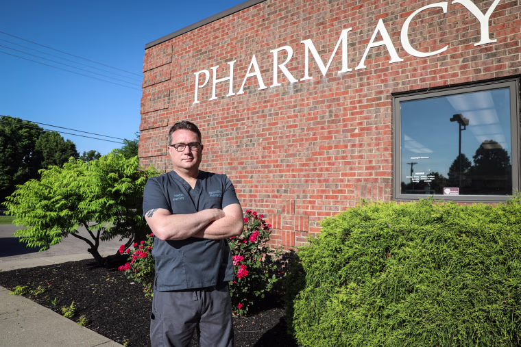 Nate Hux owns two pharmacies next door to each other. One, Pickerington Pharmacy, takes almost every kind of insurance. The other, Freedom Pharmacy, takes none.