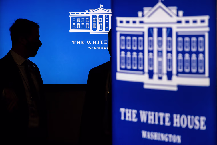 Secret service agents stand near screens before President Joe Biden met virtually with independent farmers and ranches from the White House on Jan. 3, 2022.