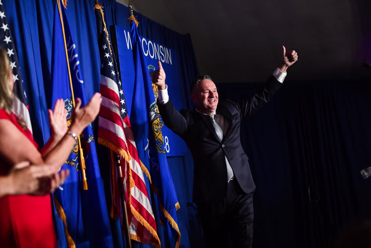 Republican gubernatorial candidate Tim Michels gives the thumbs up during his primary election night event at on Aug. 9, 2022, in Waukesha, Wis.