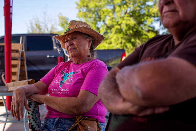 Anita Anaya listens during breakfast at Darla’s Kitchen in Brackettville, Texas, on Aug. 10, 2022.