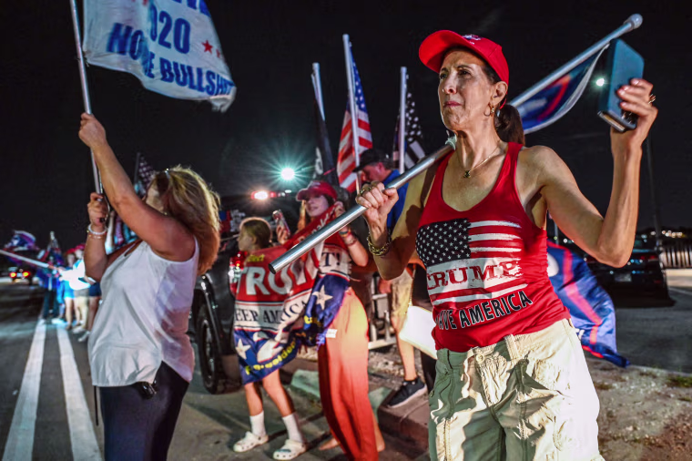 Image: Supporters of former President Donald Trump stand outside his residence in Mar-a-Lago, Palm Beach, Fla, on Aug. 8, 2022.