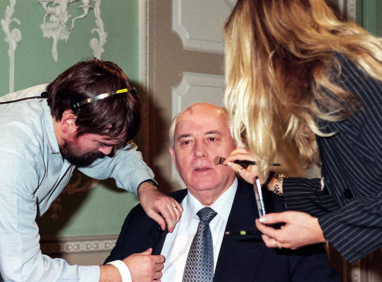 Studio technicians make last minute adjustments before former Soviet president Mikhail Gorbachev is interviewed on the BBC's Breakfast with Frost program on Oct. 27, 1996.