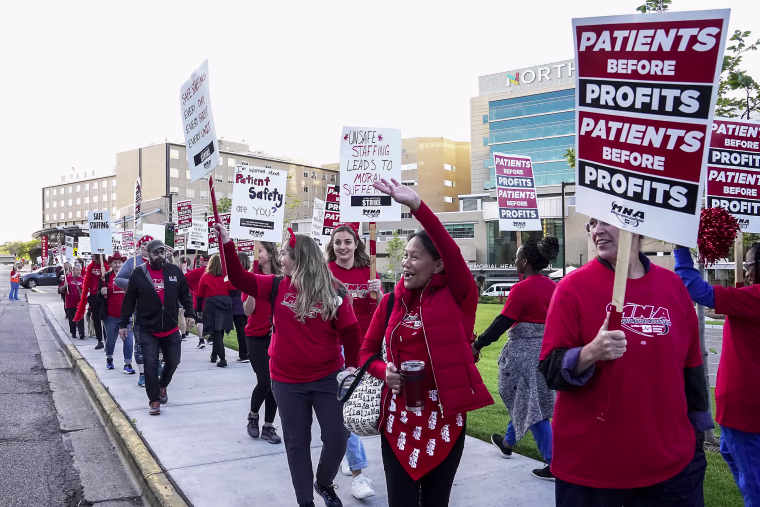 Nurses strike outside North Memorial Health Hospital in Robbinsdale, Minn., on Sept. 12, 2022.