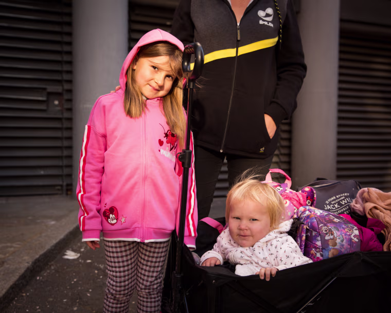 Image: Violet and Everdeen Higbee were waiting for an hour, and didn't know how long they'd have to wait in line, about 4.5 miles away from Westminster.