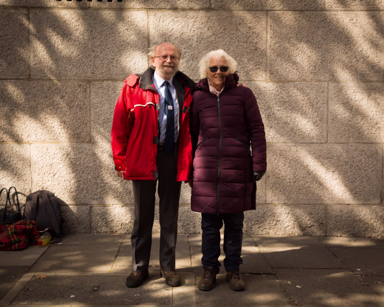 Hugh Milner, 78, and Elizabeth Milner, 76, joined the queue at 2 a.m. and have been waiting about 10 and a half hours. They estimate they have about three more hours to to before they reach the palace and the queen.
