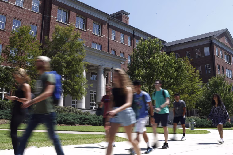 Students walk on campus at the University of Georgia