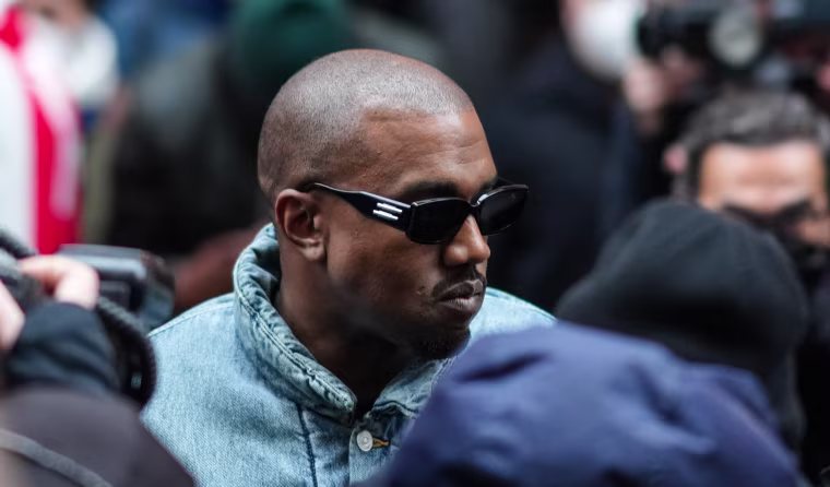 Kanye West outside Kenzo, during Paris Fashion Week in France, on Jan. 23, 2022.