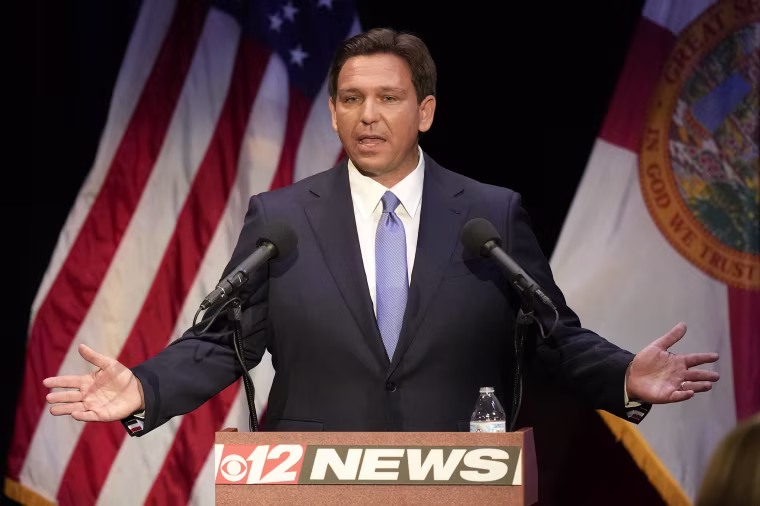 Florida's Republican Gov. Ron DeSantis speaks during a televised debate against Democratic opponent Charlie Crist, at Sunrise Theatre in Fort Pierce, Fla., Monday, Oct. 24, 2022.