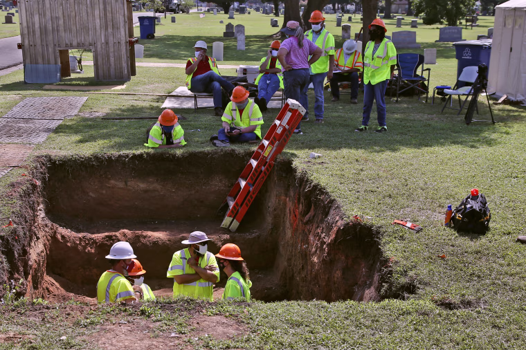Work continues on an excavation of a potential unmarked mass grave from the 1921 Tulsa Race Massacre, at Oaklawn Cemetery in Tulsa, Okla.,