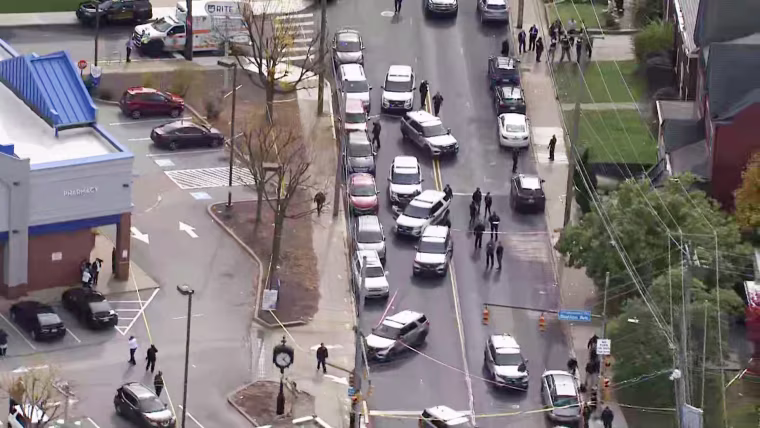 The scene outside a church where officers said "multiple shots" were fired in Pittsburgh on Friday.