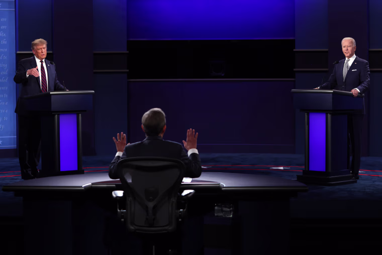 Then-President Donald Trump and Then-Democratic presidential nominee Joe Biden participate in a debate