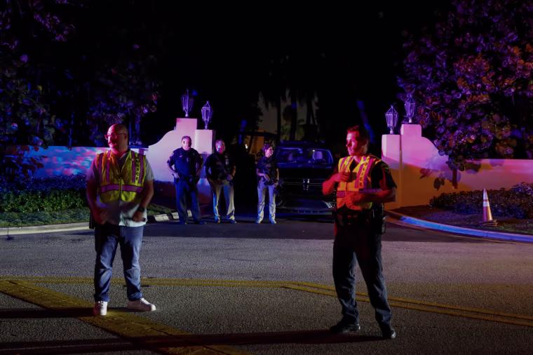 Image: Secret Service and Palm Beach police are seen in front of the home of former President Donald Trump at Mar-A-Lago on August 8, 2022 in Palm Beach, Fla.