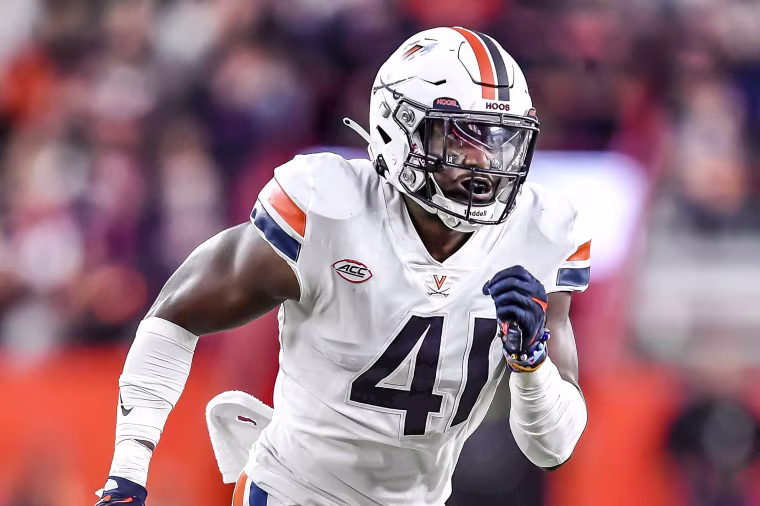 Virginia linebacker D'Sean Perry runs on the field during the second half of an NCAA college football game against Syracuse on Sept. 23, 2022 in Syracuse, N.Y.