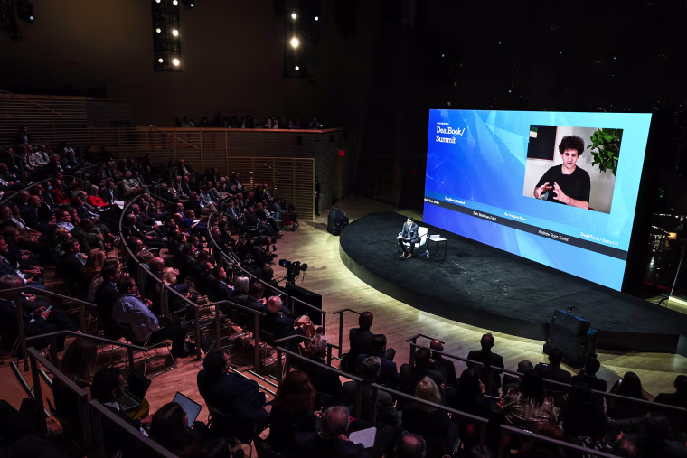 Image: Andrew Ross Sorkin speaks with FTX founder Sam Bankman-Fried during the New York Times DealBook Summit in the Appel Room at the Jazz At Lincoln Center on Nov. 30, 2022 in New York.