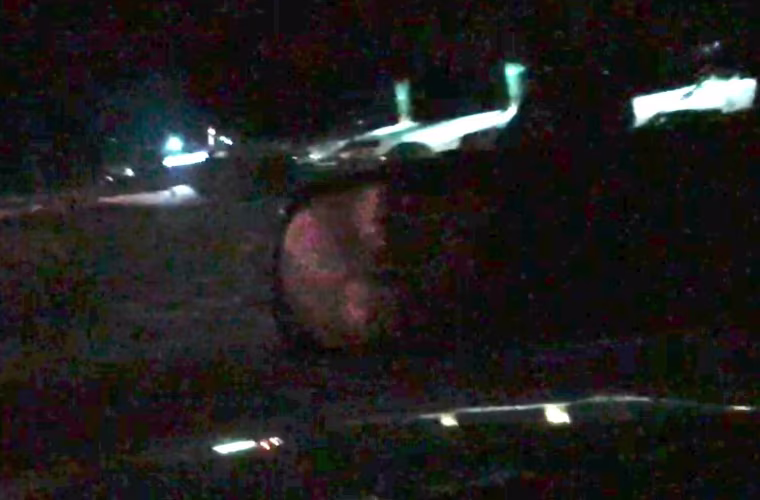 A screengrab taken from one of the four videos shows a reflection in the car’s rear-view mirror that resembles Aldrich. 