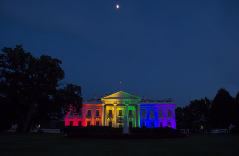 The White House is blanketed in rainbow colors symbolizing LGBT pride on June 26, 2015.
