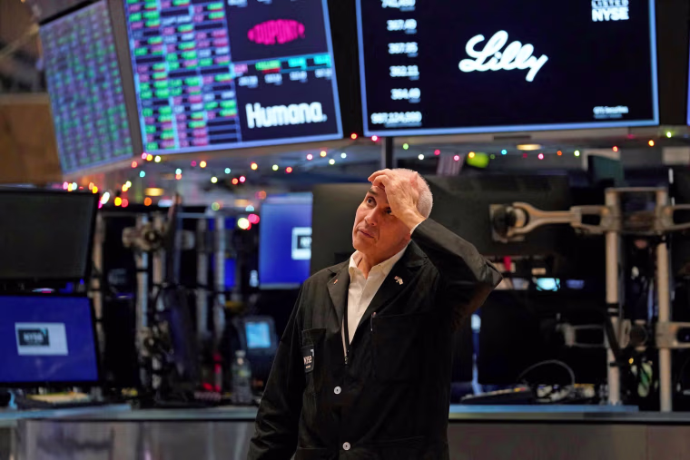 A trader reacts on the floor of the New York Stock Exchange at the closing bell on Dec. 30, 2022 in New York. 