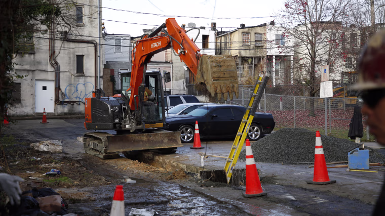 Construction workers repair water infrastructure in Baltimore.