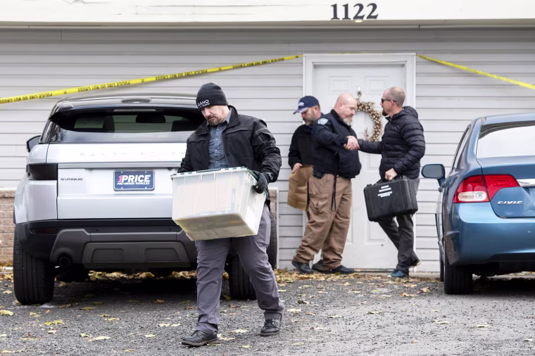 Officers investigate the deaths of four University of Idaho students