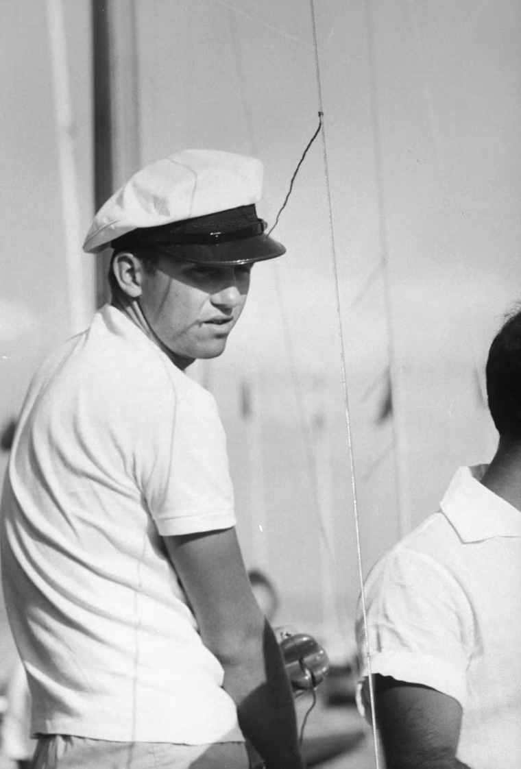 Prince Constantine (L) on his sail boat, during olympics.
