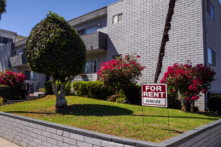 A 'for rent' sign is displayed outside an apartment building on Sept. 22, 2022 in Los Angeles.