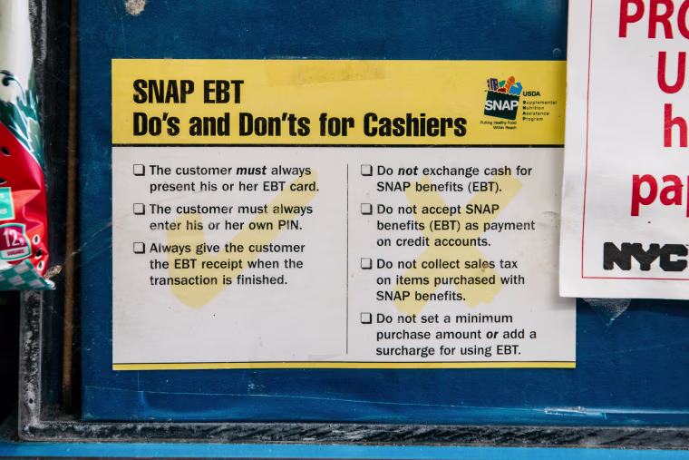 A SNAP guide for cashiers at a grocery store on in New York on Dec. 5, 2019.