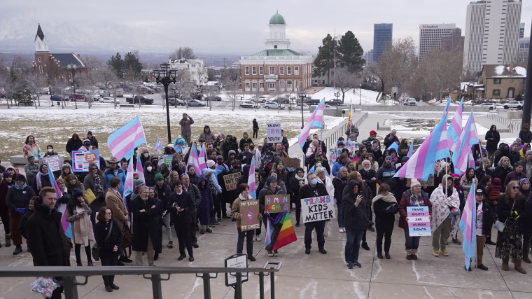 People gather in support of transgender youth during a rally at the Utah State Capitol
