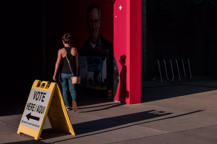 A voter walking into a polling location. 