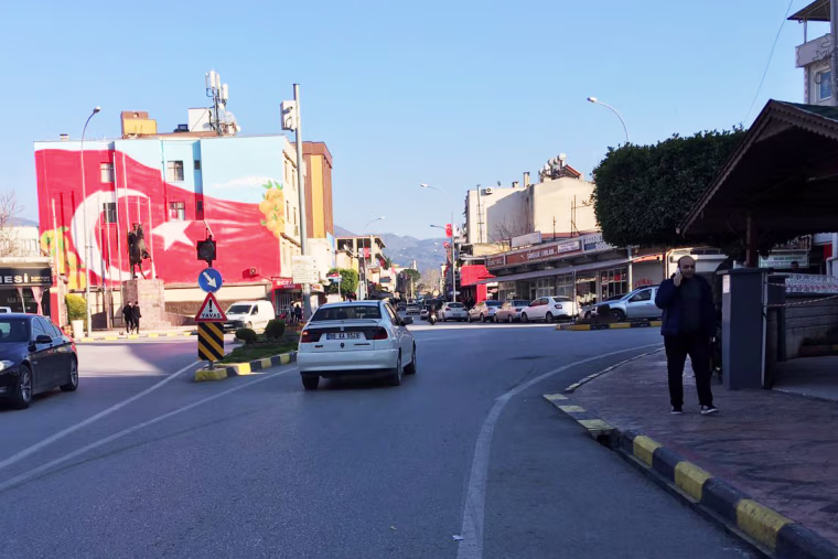 Erzin's streets have remained busy, like this intersection in the city's center Tuesday. 