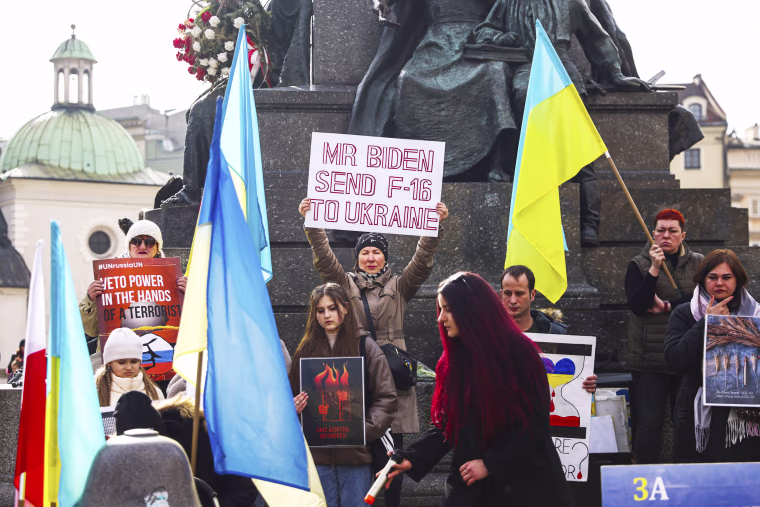 Ukrainian citizens and supporters attend a demonstration of solidarity with Ukraine