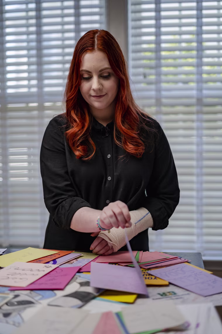 Virginia elementary school teacher Abigail Zwerner looks through some letters and gifts sent to her by people across the country at an undisclosed location in Virginia on March 20, 2023. 