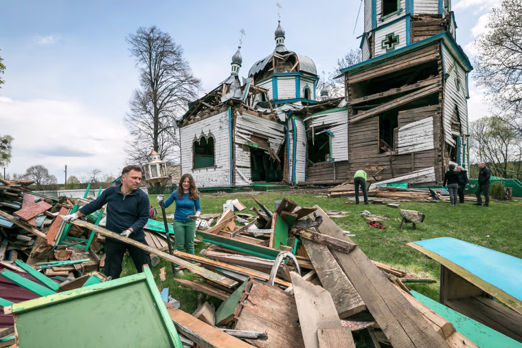 Ihor Poshyvailo, co-founder of the Heritage Emergency Response Initiative, works with his crew to salvage the Church of the Nativity of the Blessed Virgin Mary that was damaged by Russian shelling in March 2022.