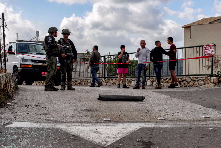 The Israeli army said it intercepted rocket fire from Lebanon on April 6 after clashes between Israeli police and Palestinians inside Islam's third-holiest site drew warnings of retaliation from around the region.