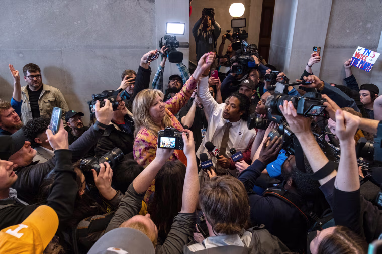 Democratic state Reps. Gloria Johnson of Knoxville and Justin Jones of Nashville raise their arms in defiance after a vote that expelled Jones from the governing body on April 6, 2023 in Nashville, Tennessee. Jones was expelled after he, Johnson and Rep. Justin Pearson of Memphis led a protest at the Tennessee State Capital building in the wake of a mass shooting at a Christian school in which three 9-year-old students and three adults were killed by a 28-year-old former student of the school on March 27. Johnson and Pearson also face expulsion.