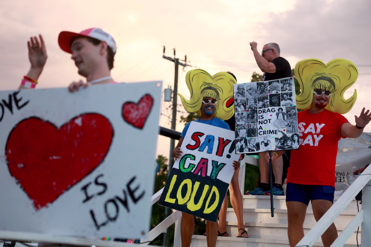 People protest anti-LGBTQ laws during the Stonewall Pride parade in Wilton Manors, Fla., on Saturday.