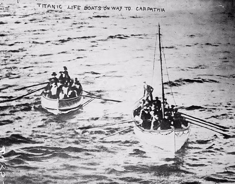 Image: Titanic survivors in life boats on their way to the RMS Carpathia in 1912.