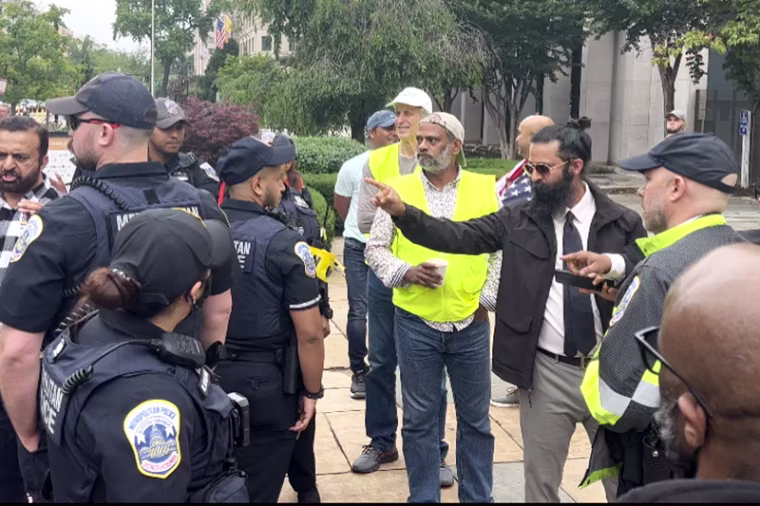 Police deescalate confrontation at protest near the White House during Prime Minister Narendra Modi's state visit.