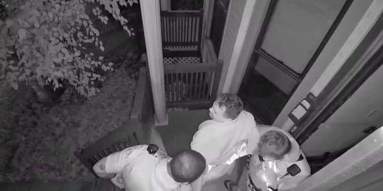 Police respond at the house of Patrick Tomlinson in Milwaukee.