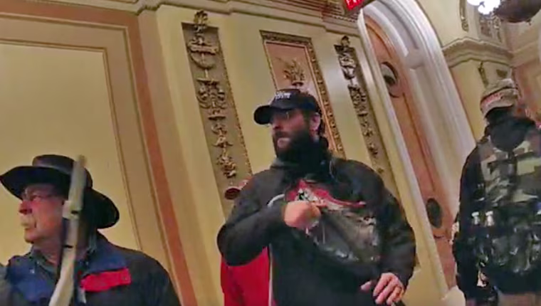 Taylor Taranto, center, at the Capitol on Jan. 6, 2021.