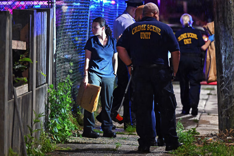 Police work the scene of a shooting on July 3, 2023 in Philadelphia, Pennsylvania. Early reports say the suspect is in custody after shooting 8 people in the Kingsessing section of Philadelphia on July 3rd.