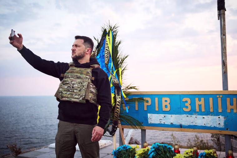 Ukrainian President Volodymyr Zelenskyy takes a selfie during his visit to Snake Island, Ukraine.