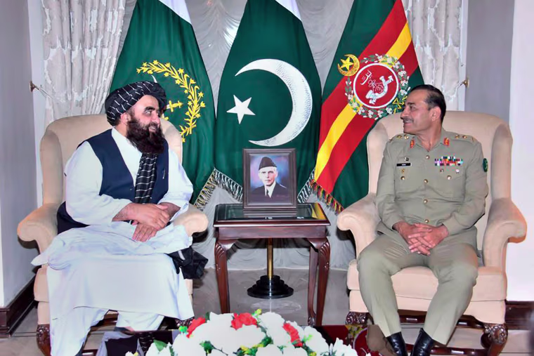 The Taliban-appointed Afghan Foreign Minister Amir Khan Muttaqi, left, meets with Pakistan's Army Chief General Asim Munir, in Rawalpindi, Pakistan on May 7, 2023.