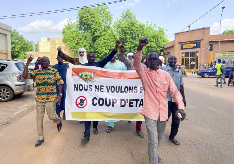 Supporters of Nigerian President Mohamed Bazoum demonstrate in his support in Niamey, Niger on July 26, 2023.