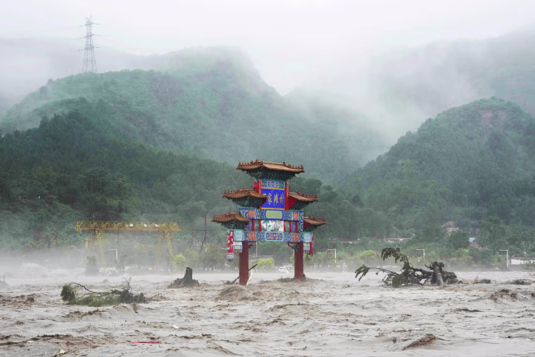 Chinese state media report some have died and others are missing amid flooding in the mountains surrounding the capital Beijing.