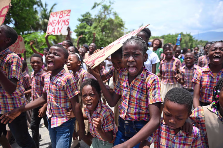 Demonstrators demand the release of kidnapped New Hampshire nurse Alix Dorsainvil and her daughter in Port-au-Prince, Haiti.
